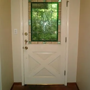 Before: 1953 single pane leaky sieve door. Either a blast of cool are hot when you walked near. Out!