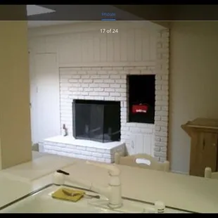 2 fireplaces here at Moon Base Alpha. Did it myself (excuse to buy tools!)...note the bottom cabinet/hearth..prior to alteration