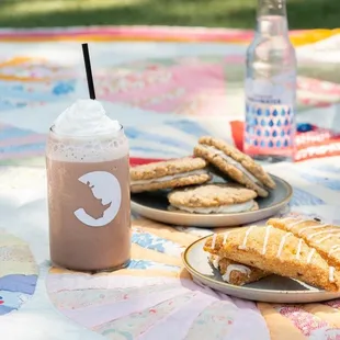 a plate of cookies and a drink