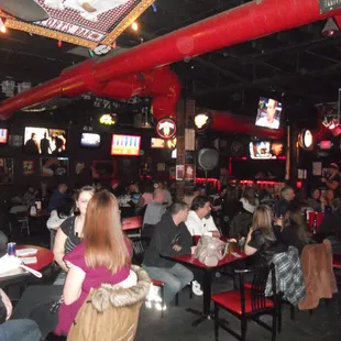 a large group of people sitting at tables