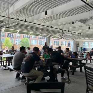 a large group of people sitting at tables
