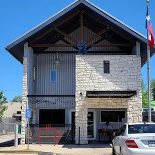 a car parked in front of a building