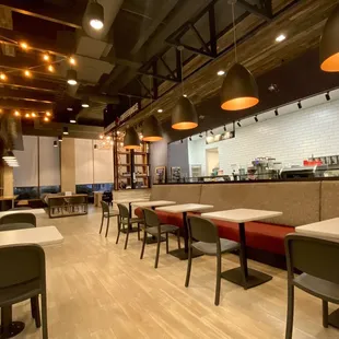 tables and chairs in a coffee shop