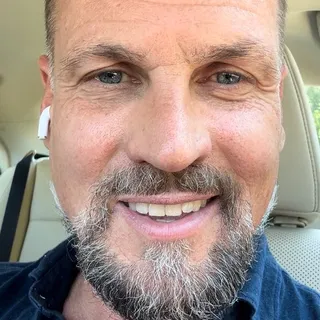 Mark L.