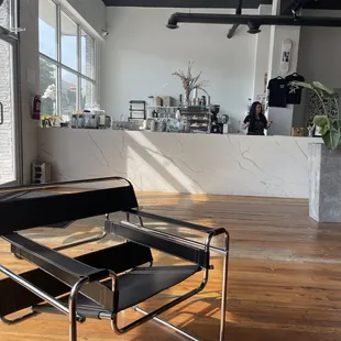 a black leather chair in a coffeehouse