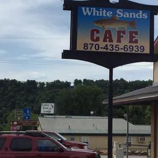 a red truck parked on the side of the road