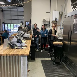 a group of people in a coffee shop