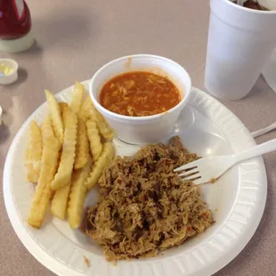 Pork plate with Brunswick Stew and Fries and endless hush puppies.