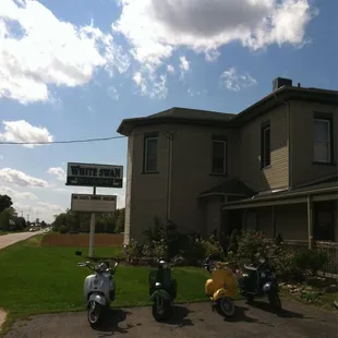 scooters parked in front of the building
