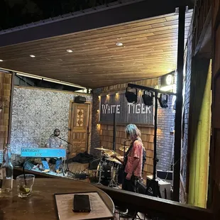 a man and a woman in a bar