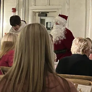 Santa entering for the Edge Mentoring event.