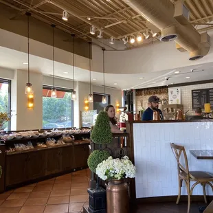 a woman standing at the counter