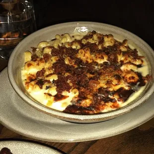 Mac and cheese, very cheesy and gooey with bacon on top. Not the best pic but it was dim so i had to use flash