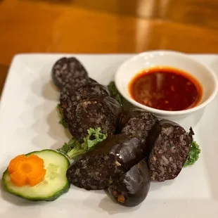 a plate of food on a wooden table