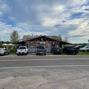 cars parked in front of the restaurant