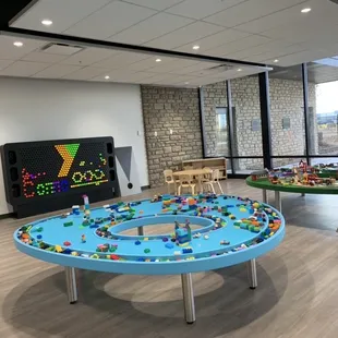 LEGO set and train station located in the Community Corner.