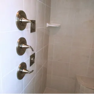 3 Valve handle system 1. Body sprayer 2. Rain head shower &amp; 3. regular/Standard shower head. (With this option you can run all units.)