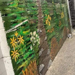 a painted mural on the side of a building