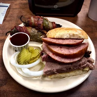Brisket/Sausage sandwich on Jalapeño bun + two Texas Twinkies. Be ready for food coma if you go with this combo.