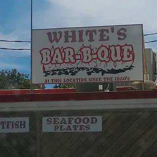 a car parked in front of a restaurant