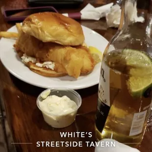 Fish sandwich with coselaw (done the right way), corona with lime, patrons, dj booth