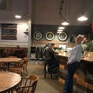 Bar &amp; tables in the tasting room at WhiteWall