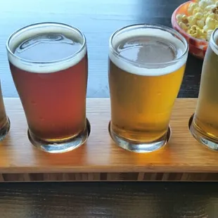 Tasters: r to l, Logger Cream Ale, Blue Collar Pale, Retread Red IPA, and Impromptu ISA