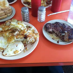 2 eggs, home fries and sausage--like no other!