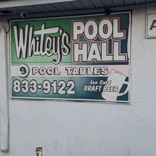 a sign on the side of a building