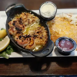 Baked Seafood combo with hashbrowns