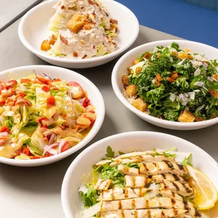 three plates of food on a table