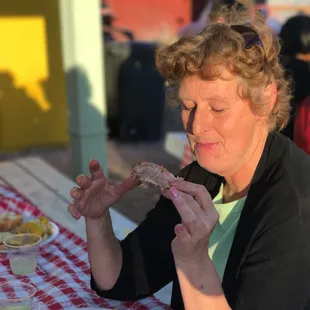 Somebody just loves those ribs with that Whitmore's Gourmet Sauce