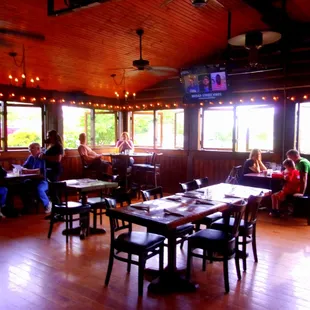 One of the dining areas with socially distanced tables