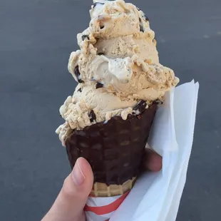 Double scoop of almond joy (flavor of the week) in a chocolate dipped waffle cone