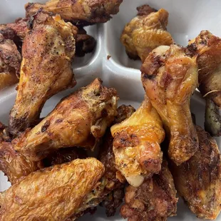 chicken wings in a styrofoam container