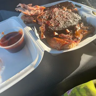 a plate of meat and sauce