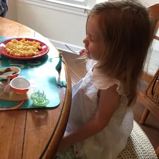 My daughter loving the mac and cheese.