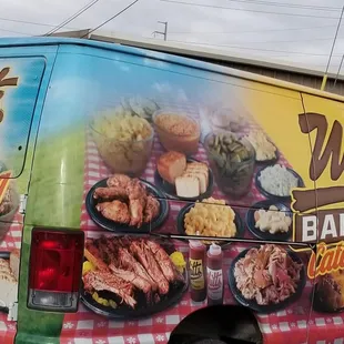 a van parked in front of a restaurant