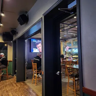 a man sitting at a table in a restaurant