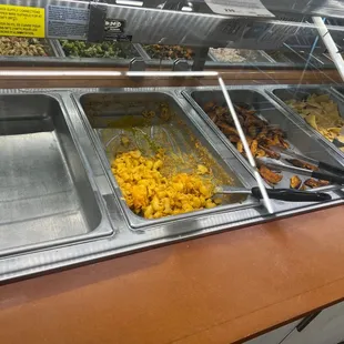 Dried up mac'n cheese and potatoes.