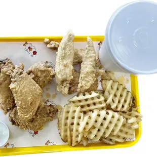 chicken and waffles on a tray