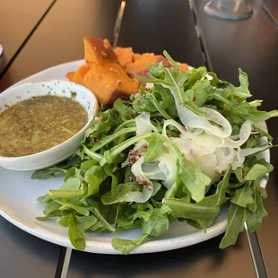 Salad and sweet potatoes that came on the side bc the cauli steak is so large lol