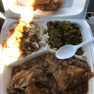 My meal smothered chicken rice and gravy and collard greens. A fried chicken thigh. Moderately priced with dessert is $11.50