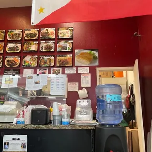 a counter with a water cooler