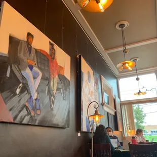 people sitting at a table in a restaurant