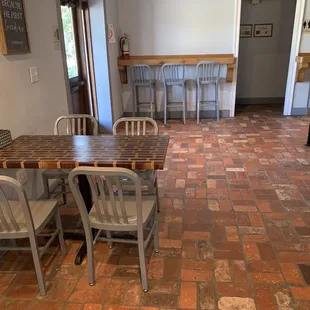 a table and chairs in a restaurant