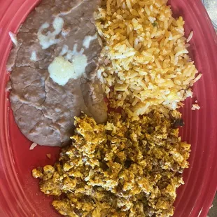 Huevos al gusto con chorizo, rice and beans.