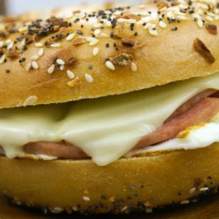 Porkroll, egg and cheese on an everything bagel.
