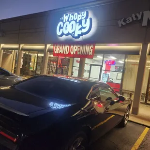 a car parked in front of a store