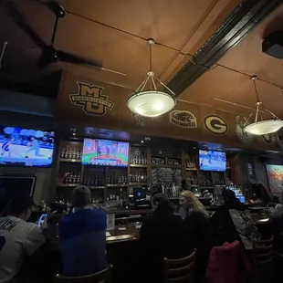 people sitting at a bar